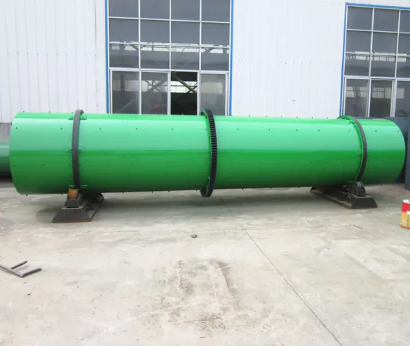 What materials can be processed in a rotary drum granulator